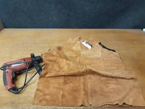 lot 773 image: NEW Steiner Leather Bib  Apron 24 x 36 Part No. 92165 and Tool Shop 12 Hammer Drill (Tested and Works)