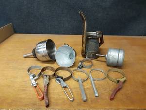 lot 780 image: Lot of Oil Filter Wrenches, Oil Can and Funnels