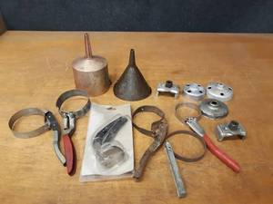 lot 781 image: Lot of Oil Filter Wrenches, Radiator Cap Pliers and Funnels