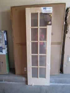 24 in. x 80 in. Rustic Knotty Alder 10-Lite Clear Glass Unfinished Wood Front Door Slab
