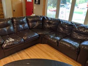 lot 209 image: Classic Faux Leather Sectional Couch (37x84x40 Both Sections)