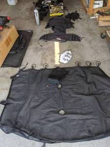 lot 40 image: 2014 Jeep Accessories Smittybilt G.E.A.R.-Jeep Seat Covers, Spare Tire Cover, & More
