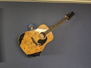 lot 119 image: Guitar Signed by Local Legend Tim Mahoney