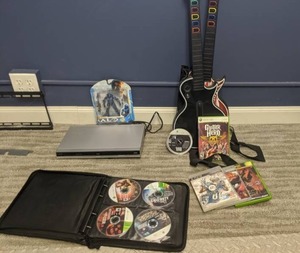 lot 123 image: Guitar Hero, Xbox 360 and PS3 Games, Phillips DVD Player, HALO Figurine