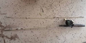 lot 22 image: Vintage Fishing Pole With Johnson Century Reel