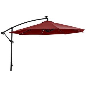 lot 17 image: Sun-Ray 10 Offset Aluminum Solar Lighted Umbrella with Cross Base, Scarlett Red