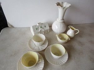 Belleek three cupssaucers, thatch...