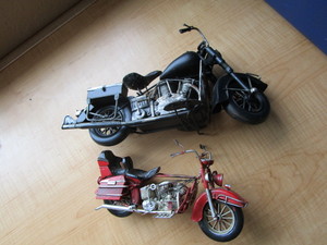 Metal motor cycles, 11 and 16...