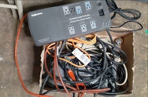 lot 25 image: Box of Extension Cords, Power Strip...