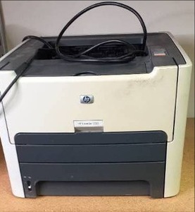 lot 64 image: HP Laser Jet 1320 Printer...