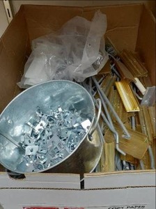 lot 72 image: Bucket of Metal Shelf Hooks, & Reta...