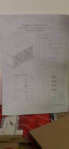 lot 106 image: TV Stand in Box Unassembled