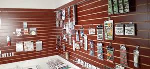 lot 137 image: (2) Slatwall Display Panels 54.5 X 48 & 4 X 8 Contents Not Included Buyer Responsible For Removal