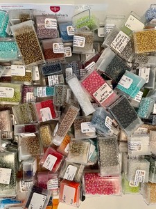 Multiple Containers of Beads