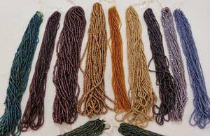 Collection of Bead Strands & Medallion