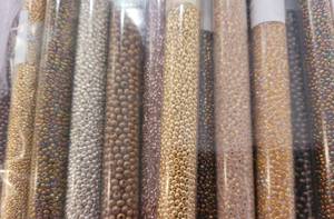 22 Vials of Earth-tone Micro Beads in a Variety of Sizes