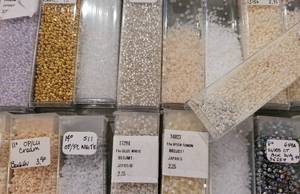 17 Vials (a few partial vials) of WhiteIvoryCream Micro Beads in a Variety of Sizes