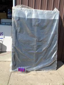 lot 5 image: New queen size box spring still in plastic. As shown.