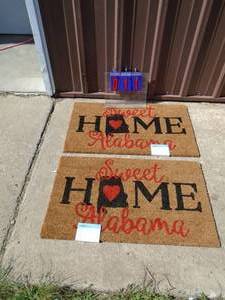 lot 11 image: Qty of 2 new door step mats. 18 x 30. Sweet home Alabama. As shown.