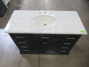 lot 326 image: Home Decorators Collection Windlowe 49 in. W x 22 in. D x 35 in. H Bath Vanity in Navy Blue with Carrara Marble Vanity Top in White with White Sink 15101-VS49C-NG