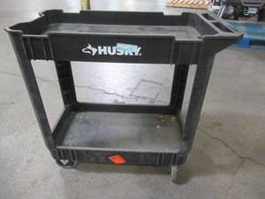 lot 55 image: Husky Double Shelf Push Utility Cart in Black. 34 x 17 14 x 32 Tall.