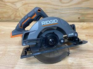 lot 40 image: RIDGID 18-Volt Cordless Brushless 7-14 in. Circular Saw (Tool Only)