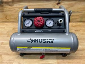 lot 51 image: HUSKY 1 Gal. Portable Electric-Powered Silent Air Compressor