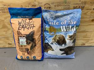lot 68 image: Lot of 2 Bags of Dog Food (Wild Earth and Taste of the Wild)