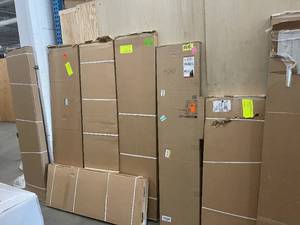 Pallet of assorted Shelving and Storage units original costumer returns