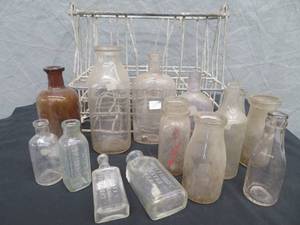 lot 86 image: ANTIQUE  VINTAGE WIRE CRATE WITH ASSORTED BOTTLES