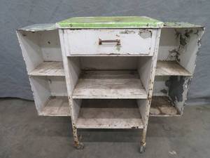 lot 99 image: ENAMEL TOPPED METAL CABINENT