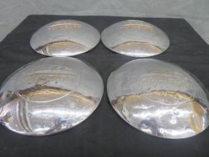 lot 102 image: 4 VINTAGE PLYMOUTH HUBCAPS