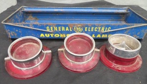 lot 106 image: STUDEBAKER LIGHTS AND METAL TRAY