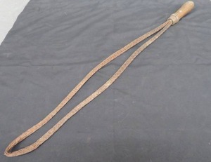 lot 142 image: ANTIQUE PRIMITIVE RUG BEATER