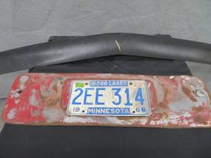 lot 147 image: VINTAGE VEHICLE LICENSE PLATE  FORD FRONT PIECE