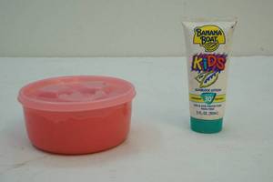 lot 88 image: Kinetic sand and sunblock