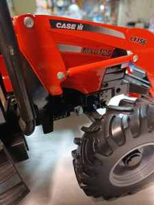 lot 52 image: Ertl Case IH MXU 125 with LX156 Loader 116th Scale - No Box