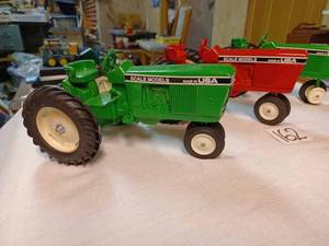 lot 162 image: Three Scale Models NF Tractors 116th Scale - No Boxes, One is Missing a front Tire