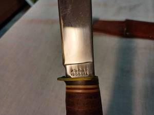 lot 174 image: Kabar 1205 USA Fixed Blade Hunting Knife with Leather Ring Handle and Sheath