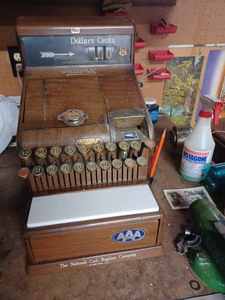 lot 183 image: Vintage National Cash Register, has a Brass Colored Badge with 3263013 and a second number 7205