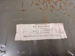 lot 197 image: Reproduction Metal Sign McCormick-Deering Farmalls Sold Here Approx. 10-inch by 10-inch