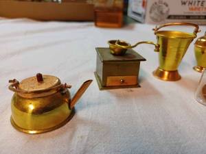 lot 226 image: Seven Copper Colored Curios, a 1965 Lincoln Cent in a Bottle and a Pair of Childs Vintage Eye Glasses