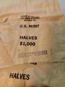 lot 230 image: Vintage U.S. Mint Canvas Bag and a Vintage Happy Days Wallet in Original Package