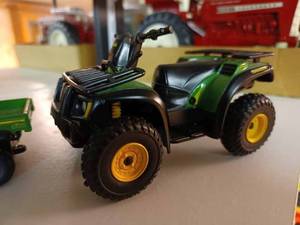 lot 237 image: John Deere 4 X 4 ATV, John Deere Gator and a John Deere Gator with Monster Tires