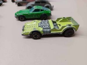lot 254 image: Assorted Tootsie Toy and Tiny Toys Cars and Trucks, 2-Hotwheels and a Majorette Trailer Air Compressor - 16 Pieces