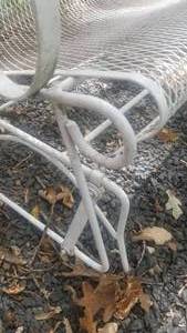 lot 425 image: White Iron Patio Loveseat Glider