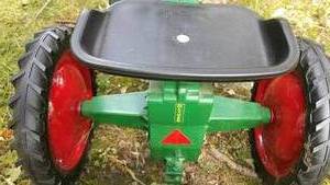 lot 105 image: Oliver 70 Row Crop Pedal Tractor with John Deere Wheel Barrel