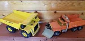 lot 216 image: Vintage Caterpillar Dump Truck and Nylint Snow Plow