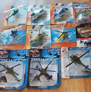 lot 306 image: Matchbox and Maisto Helicopters in the Package