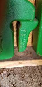 lot 11 image: John Deere 40 lb. Weights - set of 6